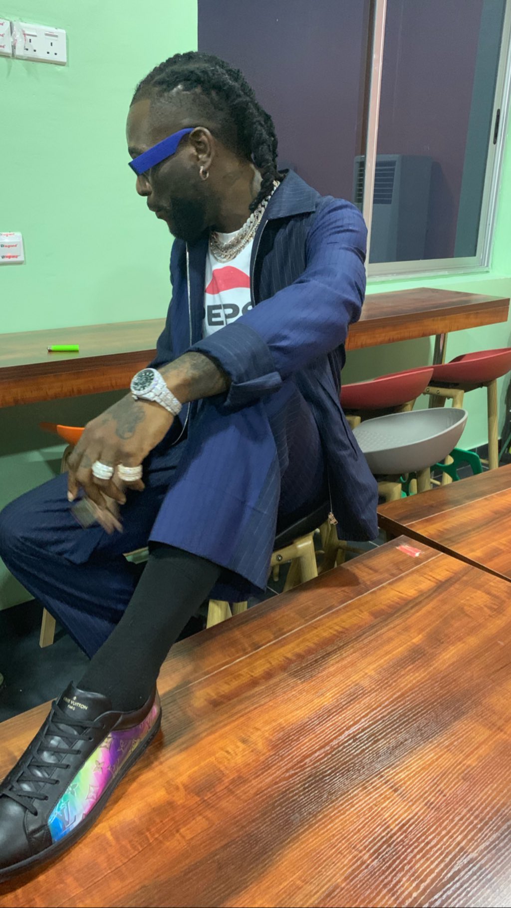 Disrespectful: Burna Boy Smoking Weed While In A Conversation With His Dad